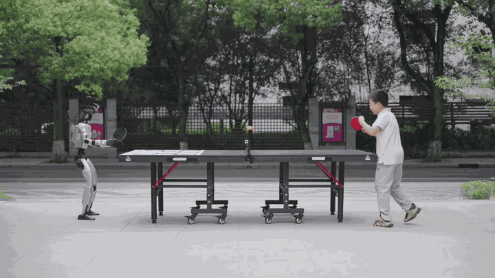 Humanoid robot playing table tennis in RoboPingpong V2